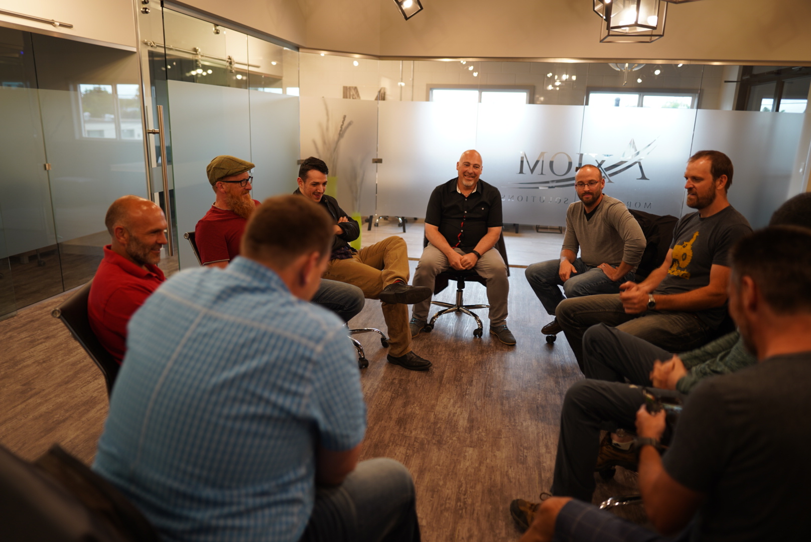 Connect'd Men — men sitting in a circle, in conversation